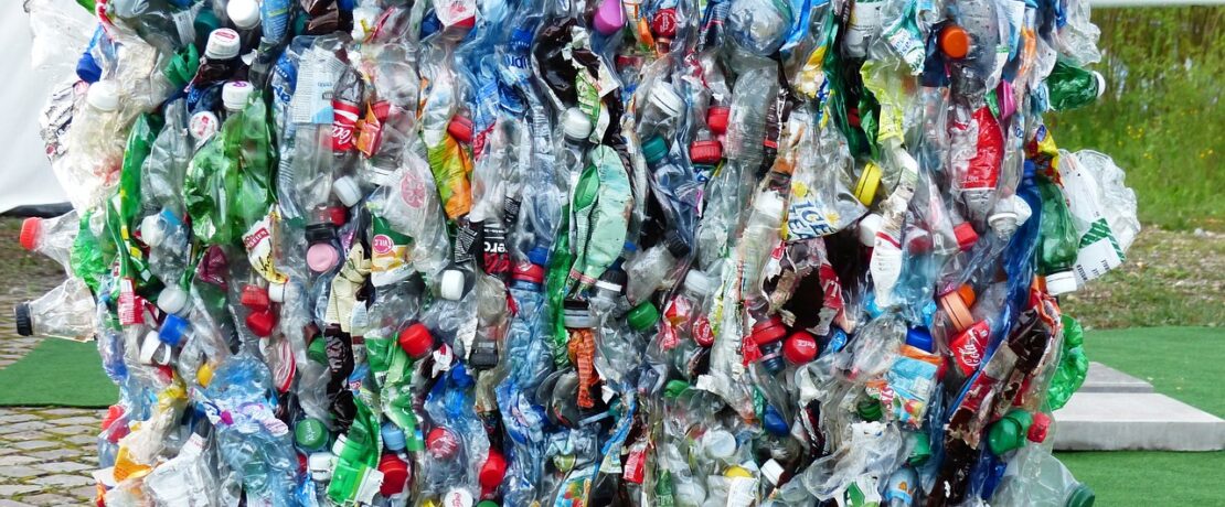 plastic bottles crushed into a cube