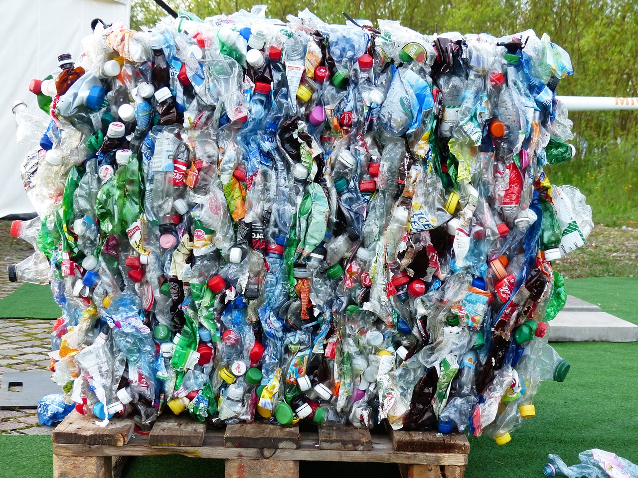 plastic bottles crushed into a cube