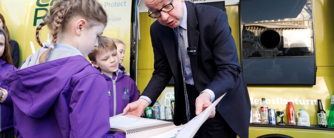 A school pupil meeting politician Michael Gove