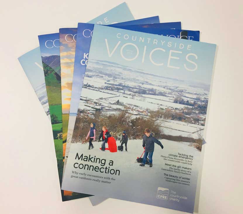 Fanned out covers of Countryside Voices magazine