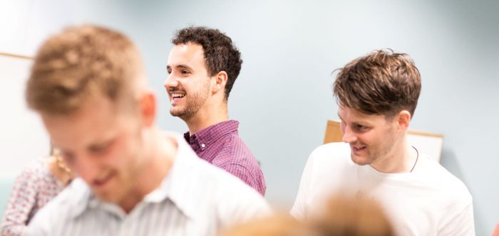 CPRE staff talk in a meeting