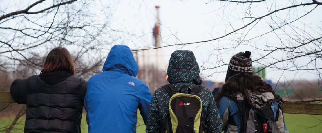 People watching a fracking test site near Manchester