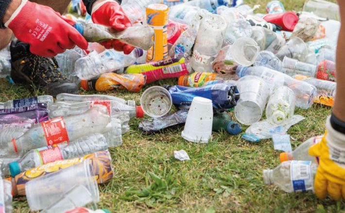 Volunteers sift through litter collected during a CPRE Green Clean event