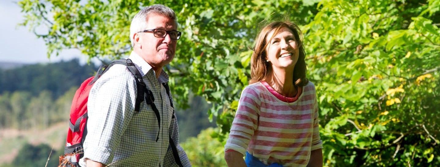 Couple walking in countryside
