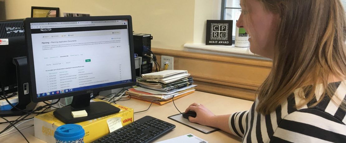 Rebecca working at desk