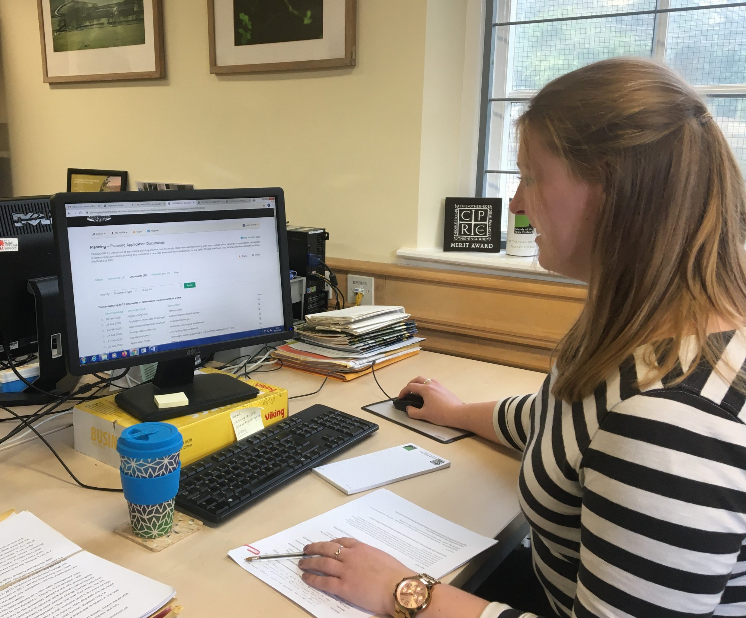 Rebecca working at desk