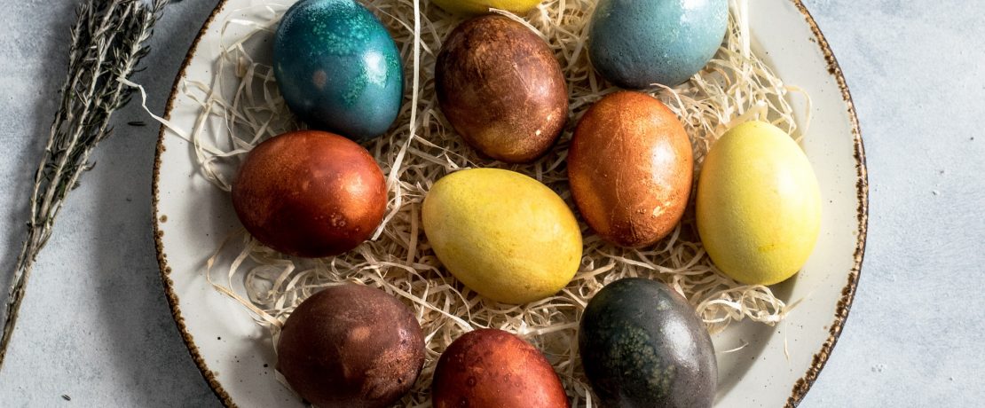 A dish of colourful painted eggs