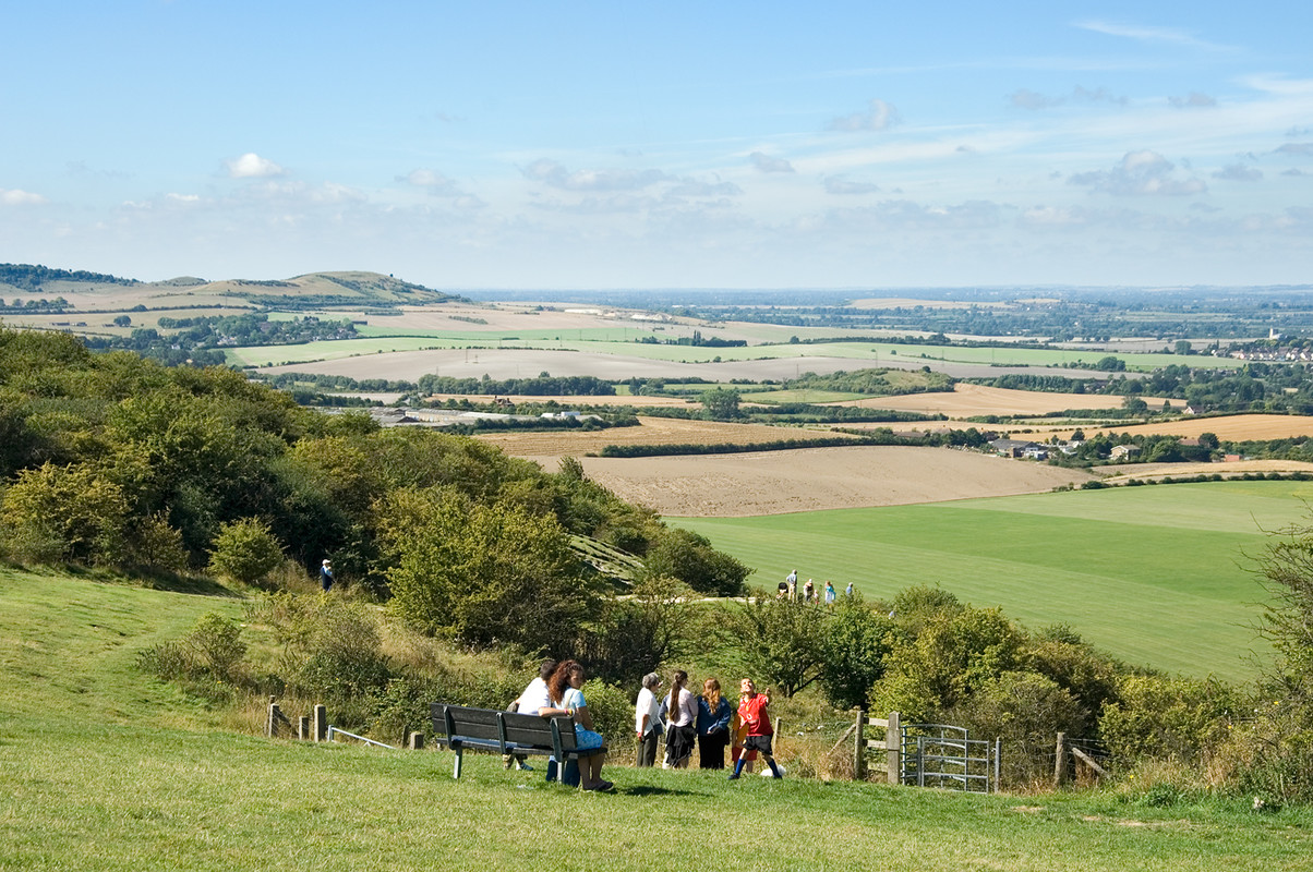 People admiring the view from Ivinghoe Beacon