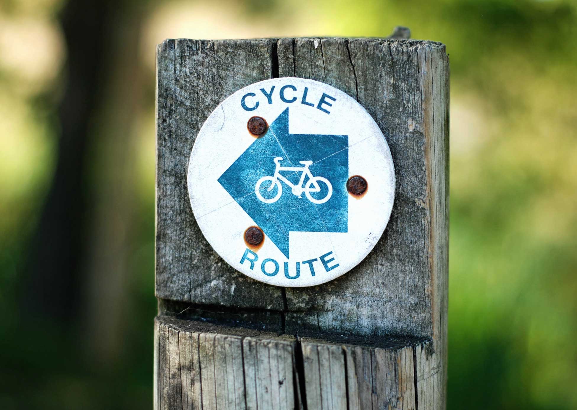 A fingerpost pointing to a cycle route