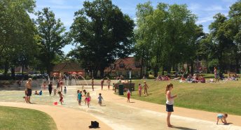 Children playing in Howard Park paddling pook in Letchworth