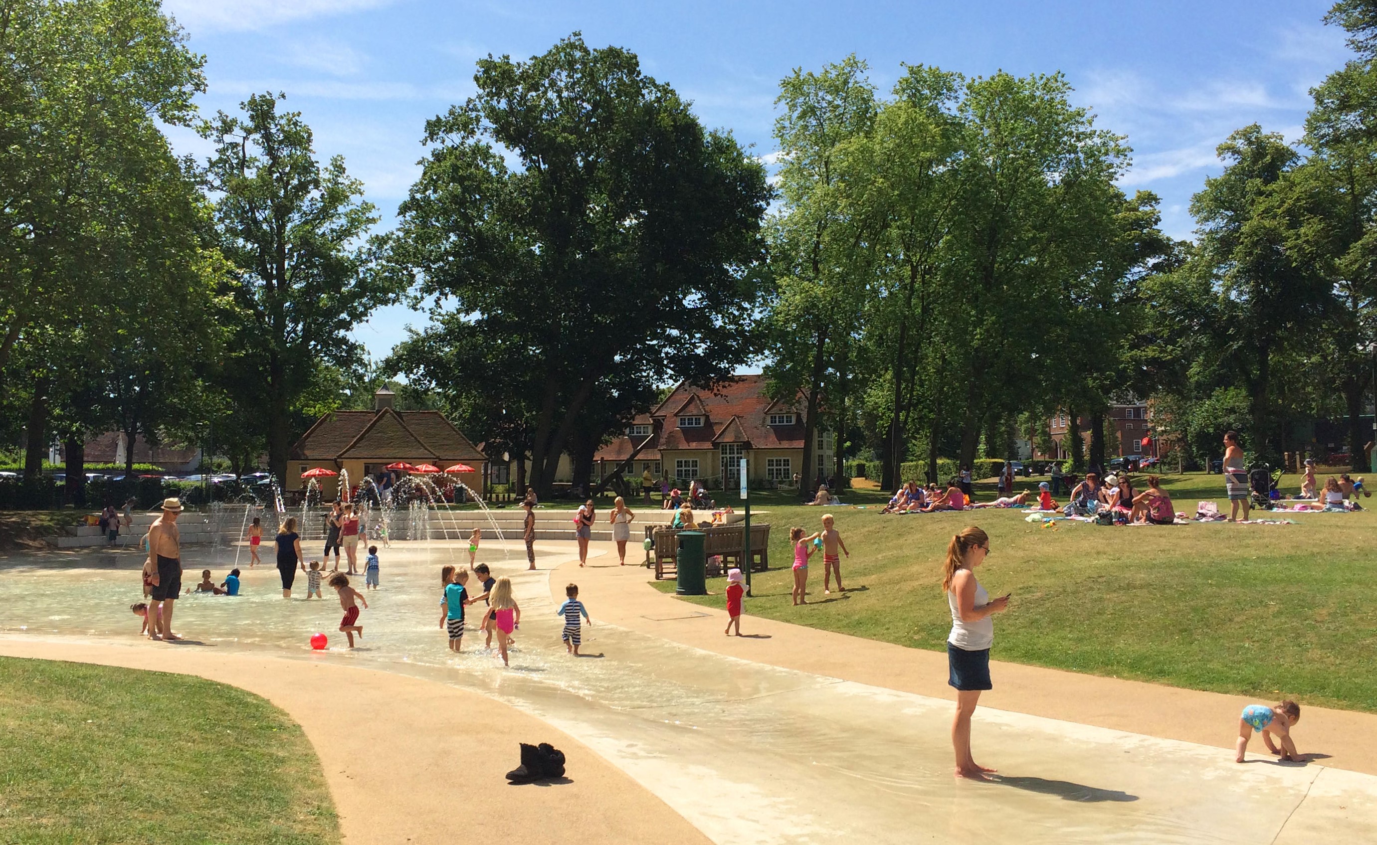 Children playing in Howard Park paddling pook in Letchworth