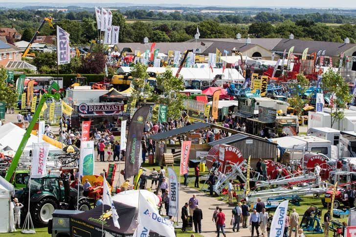 An aerial view of stalls and flags