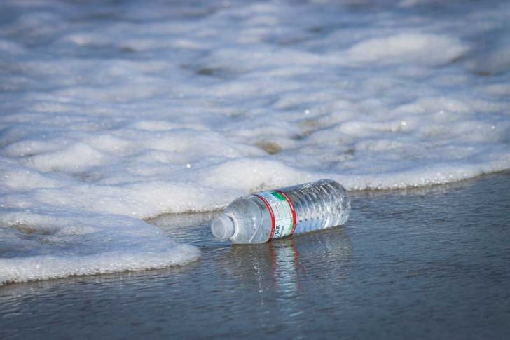 Plastic bottle washed up at sea