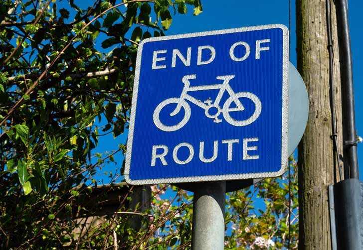 Blue 'end of route' cycle sign