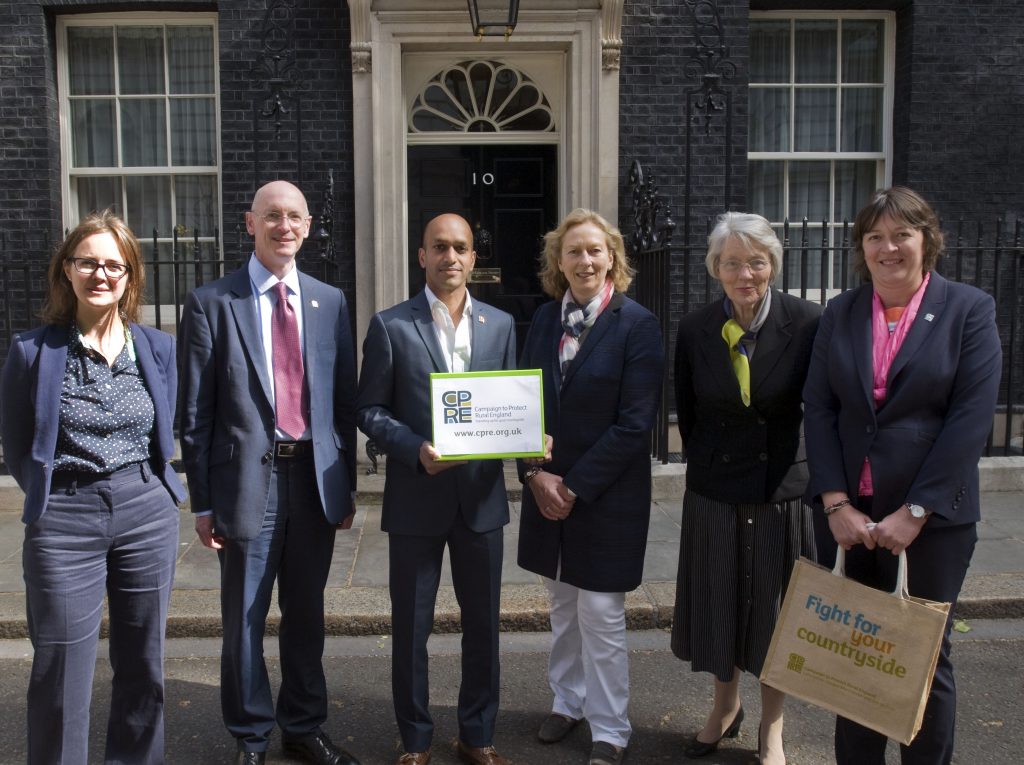 Group of people presenting petition at No 10 Downing Street