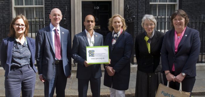 Group of people presenting petition at No 10 Downing Street