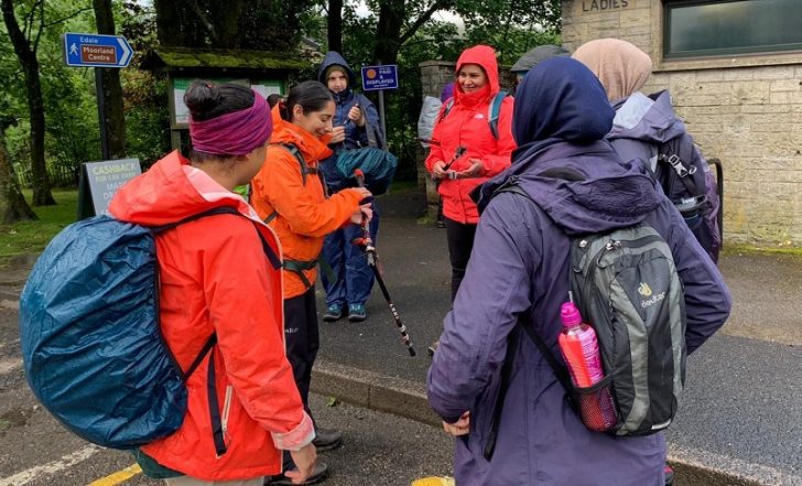 Group of women hikers getting ready to walk