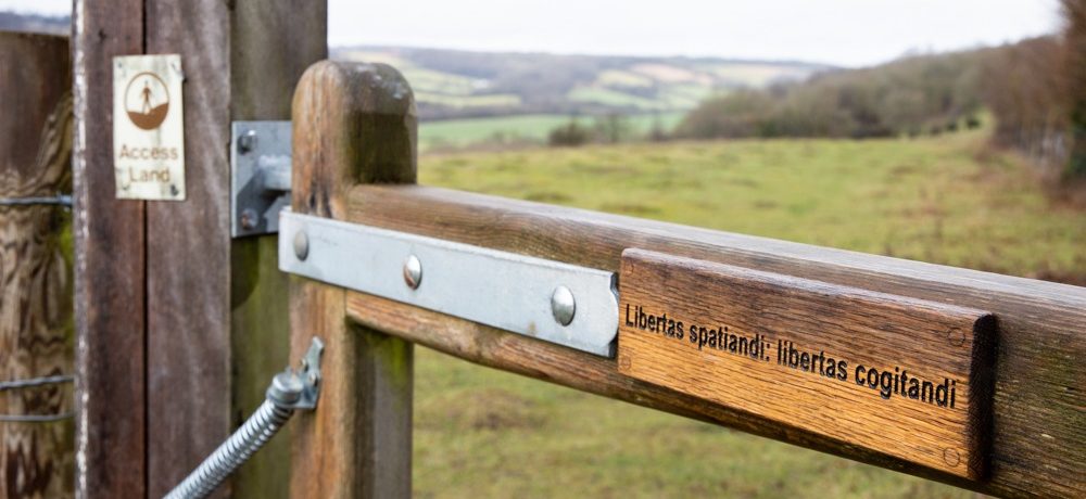 An inscribed plaque on a gate