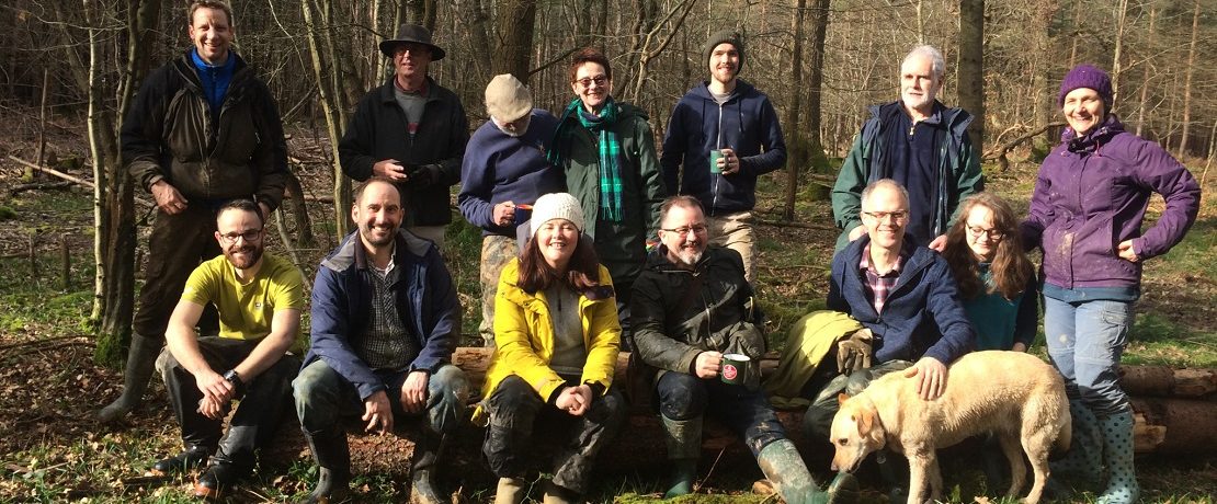 A group of people in a woodland