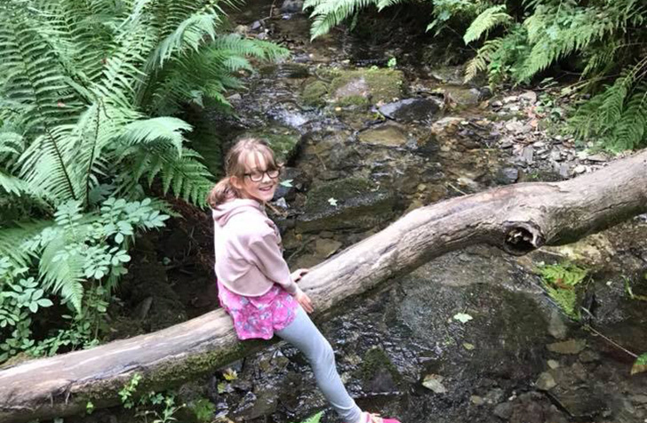 Young girl exploring the great outdoors