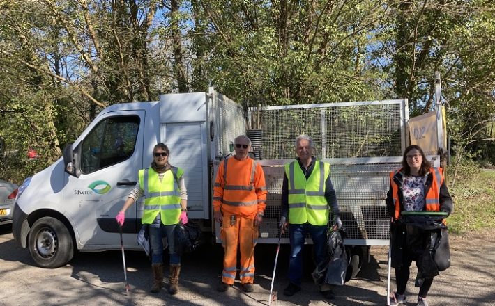 Litter pickers posing in front of their support van