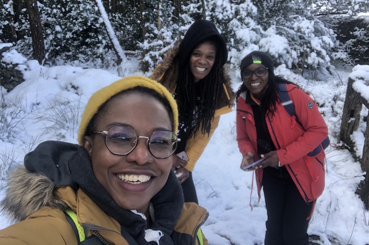 Three women in a snowy landscape