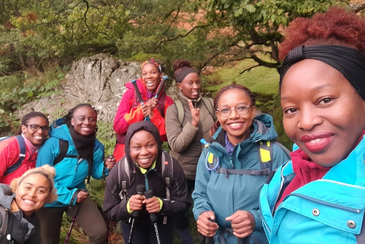 A group of women on a hill walk