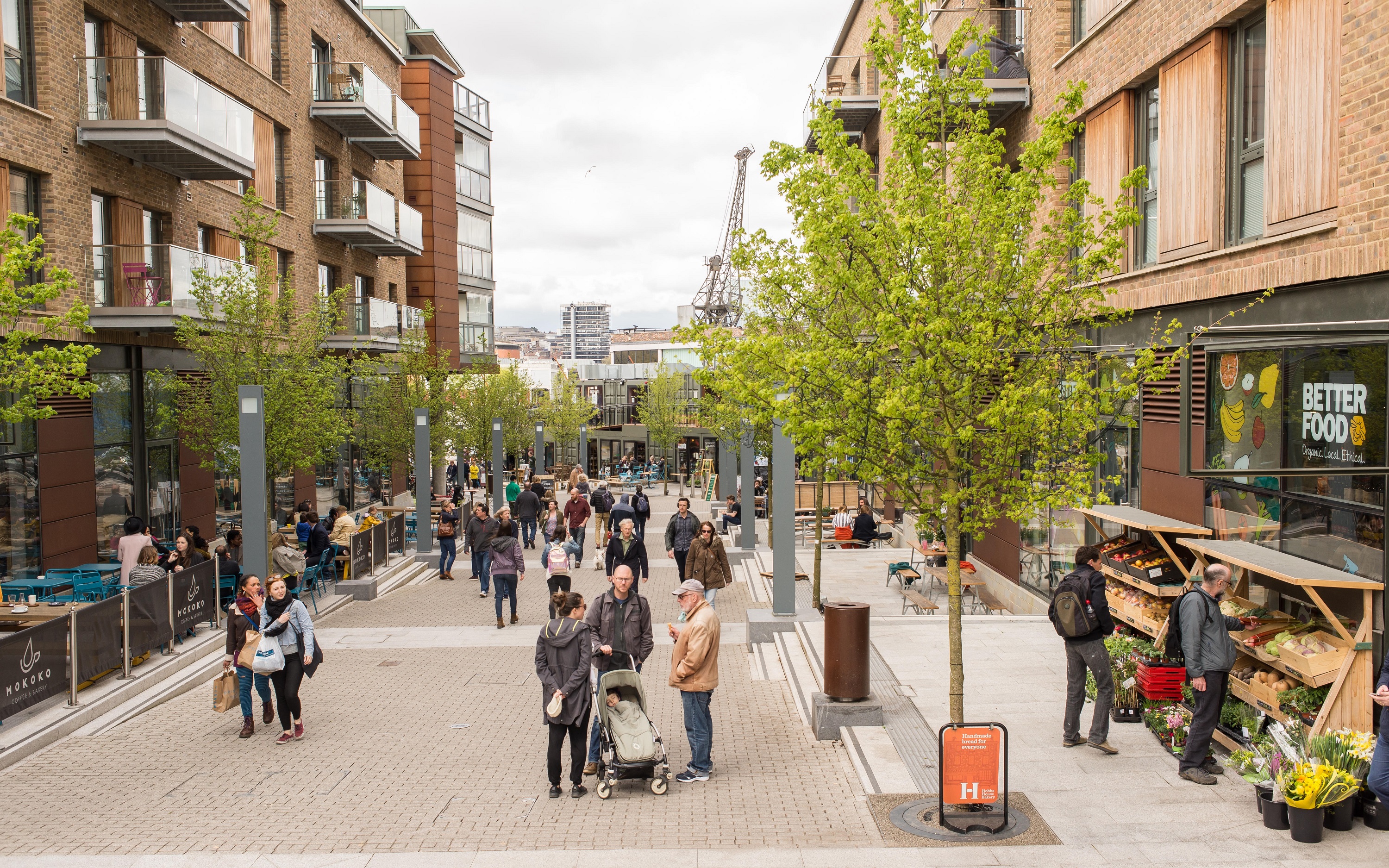 People chatting and shopping in an urban district