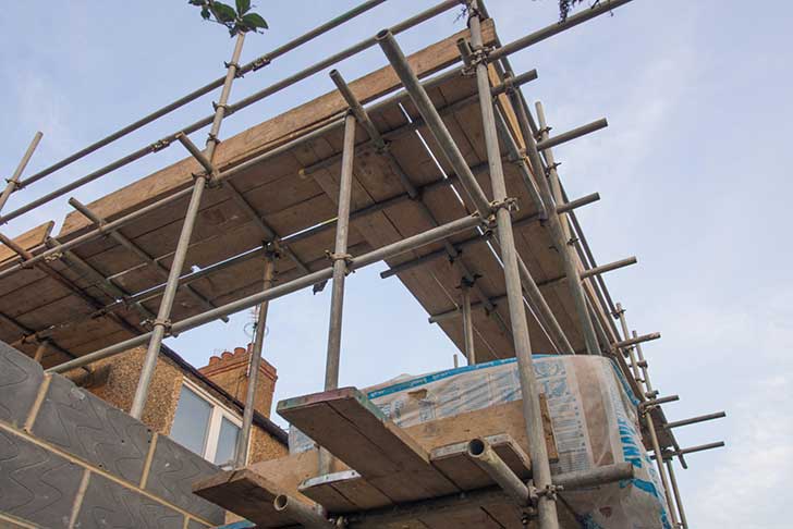 Building site with bricks and scaffolding