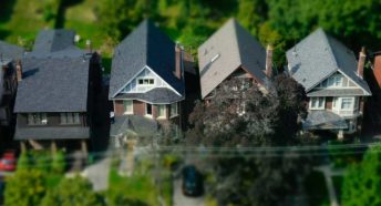 Houses as seen from above with a dramatic focus effect making some parts pin-sharp