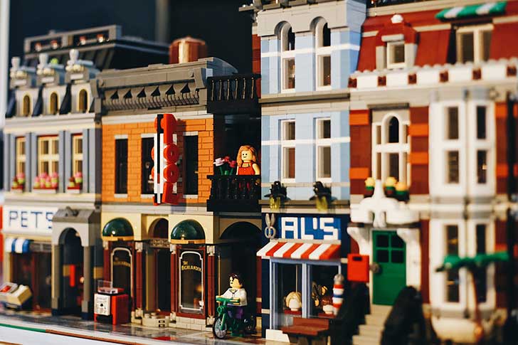 A street with shops made from Lego