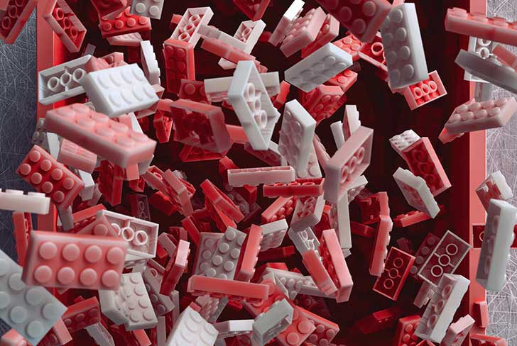 Pink and red Lego building bricks