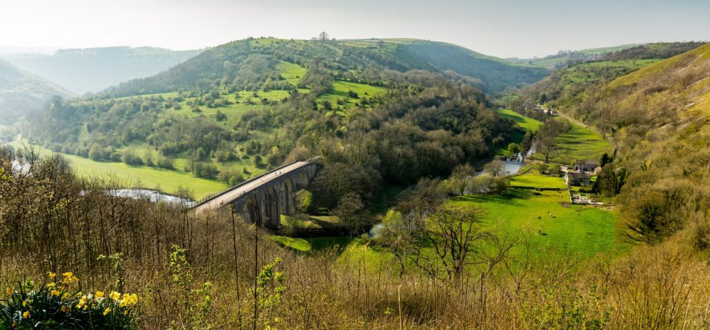 A viaduct in a green valley