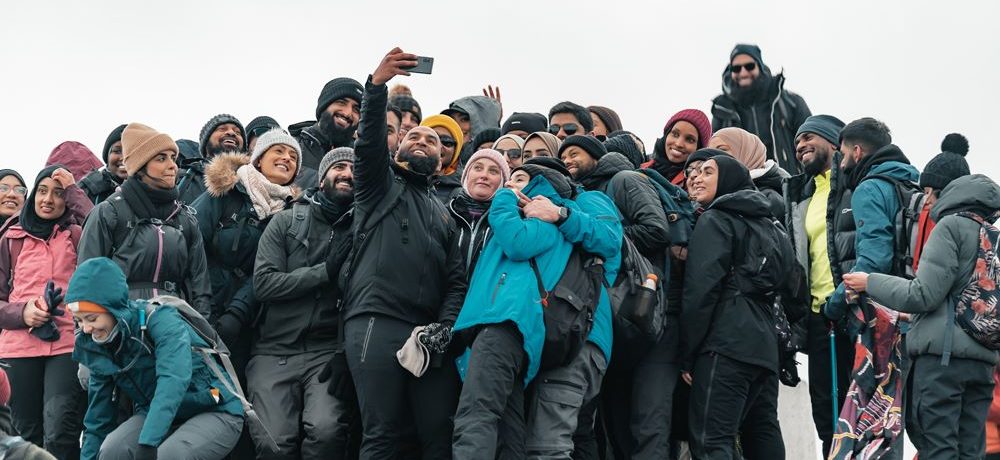 Group of hikers taking a selfie.