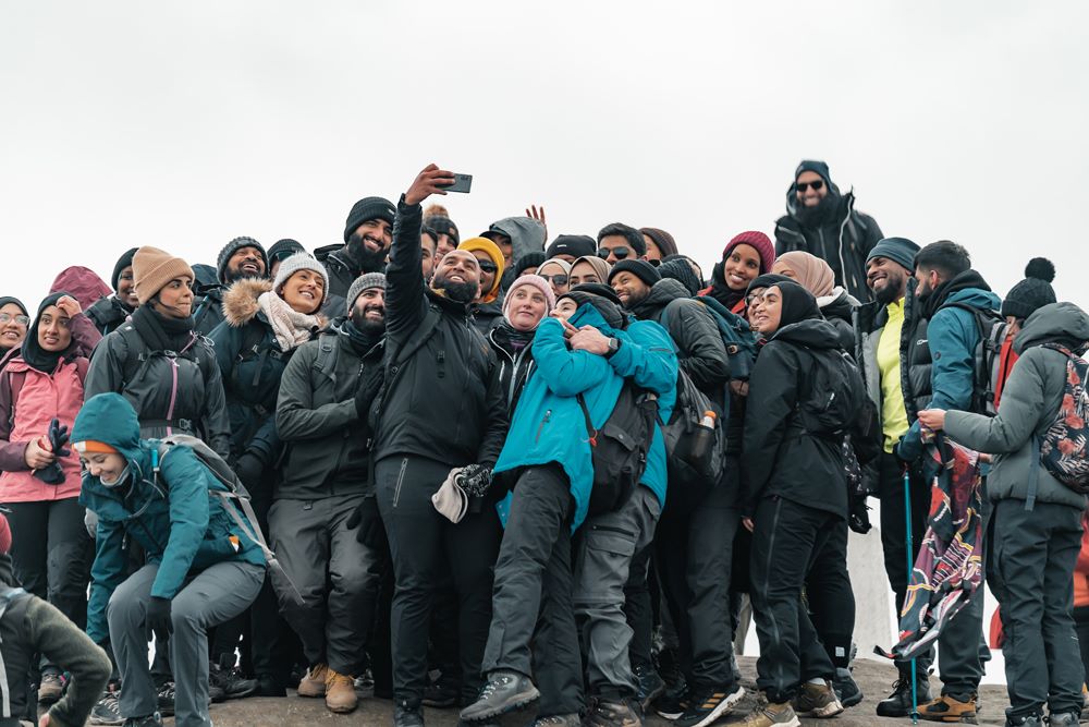 Group of hikers taking a selfie.