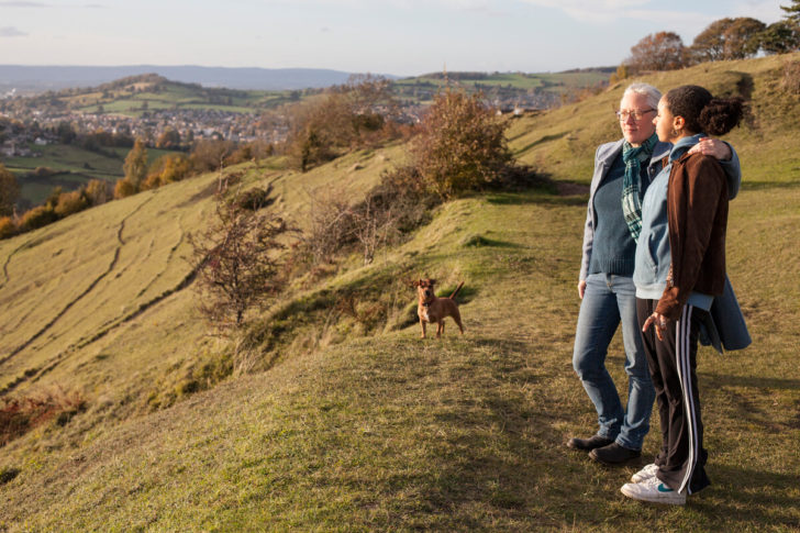 Two women looking out over the hills in the Cotswolds