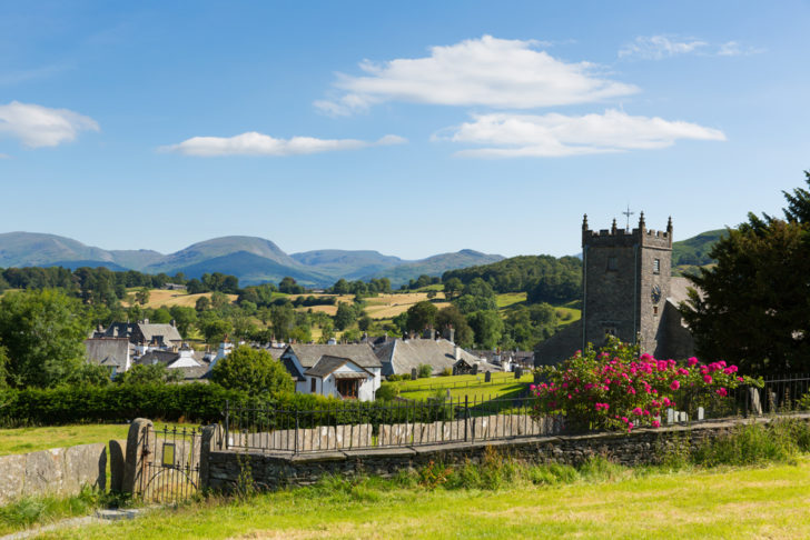 A view of Hawkshead village in the Lake District on a sunny day 