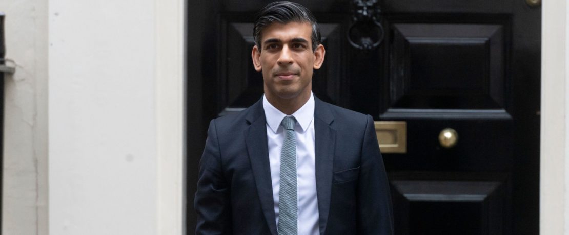 Rishi Sunak stood outside 10 Downing Street