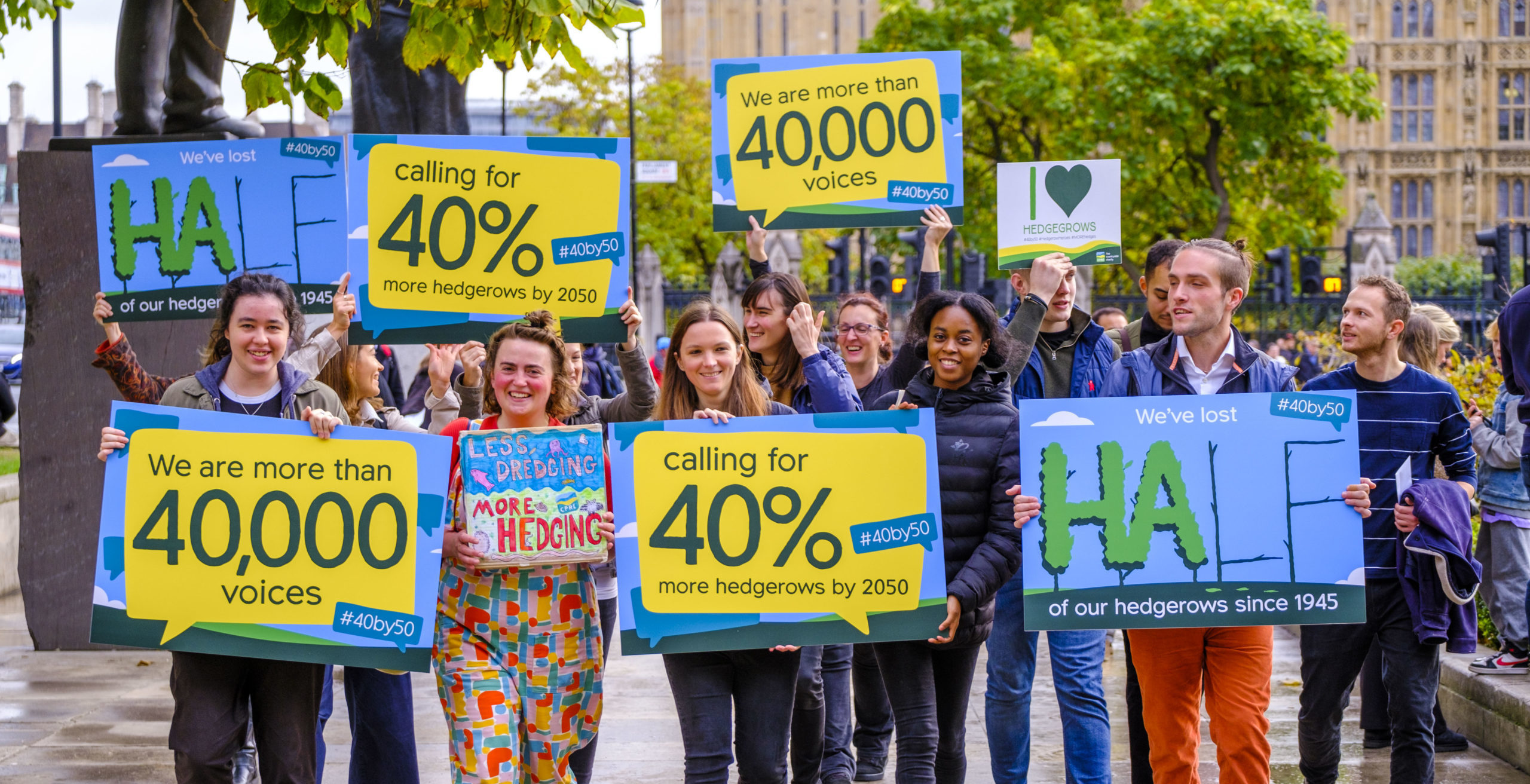 CPRE staff carrying petition boards and walking towards Defra