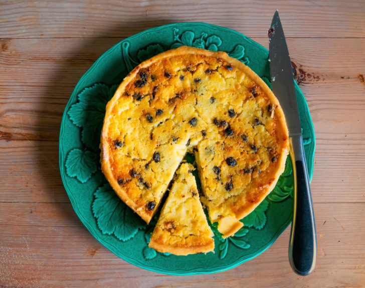 Yorkshire Curd Tart on a green plate