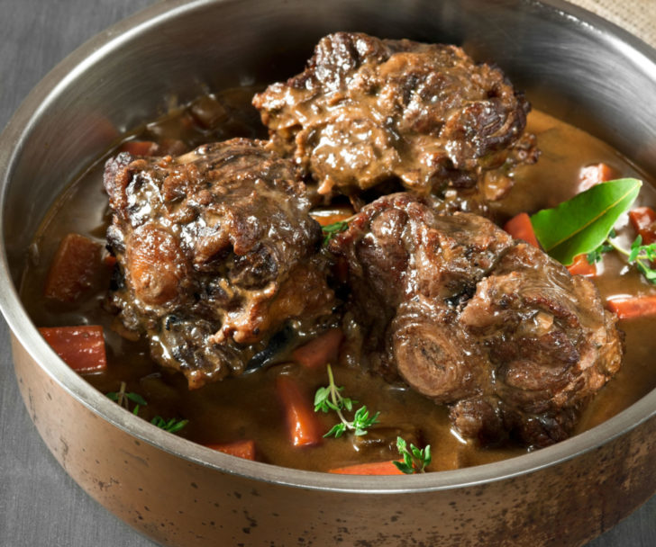 Braised Oxtail, ready to eat and garnished with fresh herbs