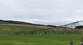 Pylon on its side in a field