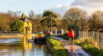 A wintry view of the River Lea with towpath alongside