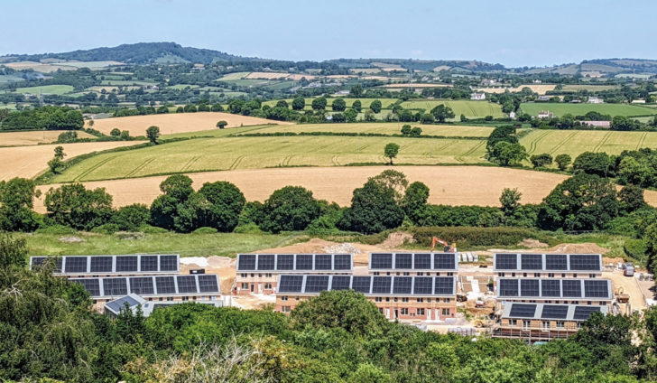 Sustainable homes with solar panels on roofs in Dorset