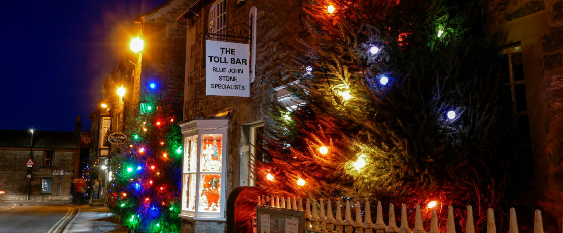 Christmas lights and trees in Castleton village.