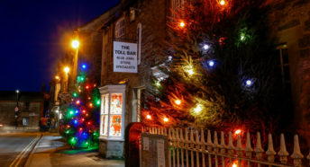 Christmas lights and trees in Castleton village.