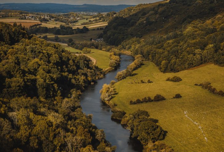 Aerial shot of the River Wye with dark clouds overhead