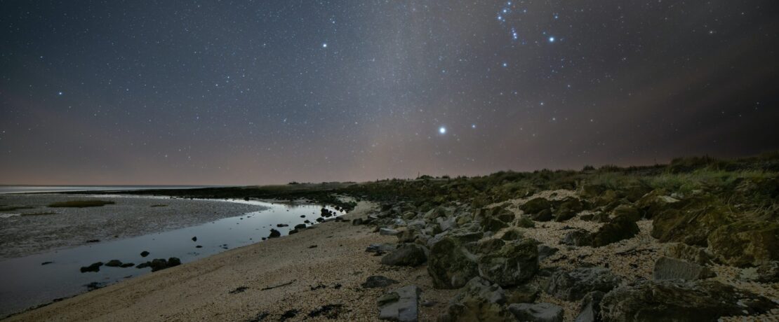 Orion visible over a beach in Kent