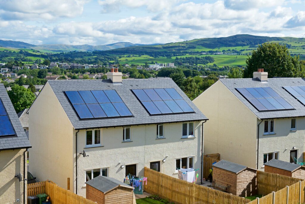 Solar panels on rooftops of new housing in Cumbria