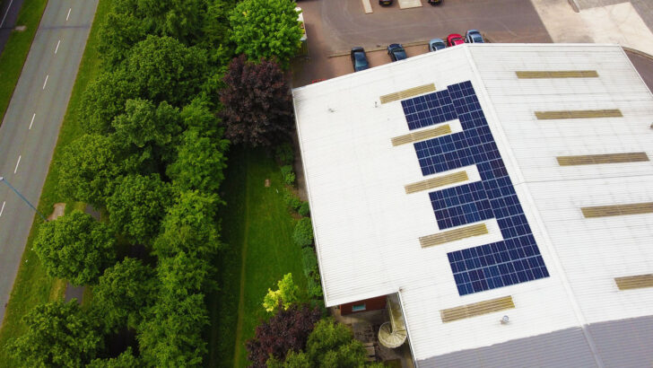 Aerial view of rooftop solar panels on a warehouse